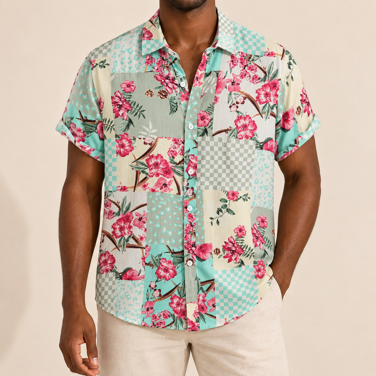 Model wearing a mint and pink floral patchwork short-sleeve shirt
