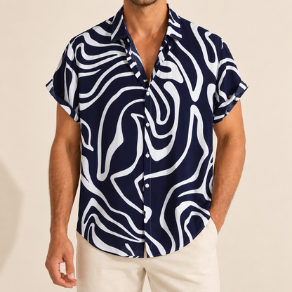 Model wearing a navy and white wavy-line print short-sleeve button-up shirt