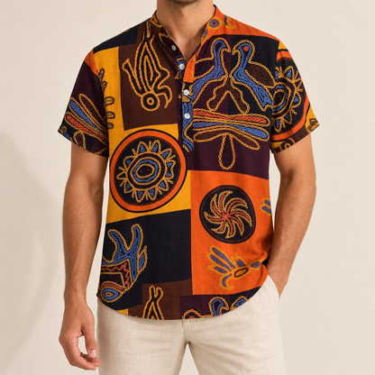 Model wearing an orange graphic panel shirt with a band collar and short button placket