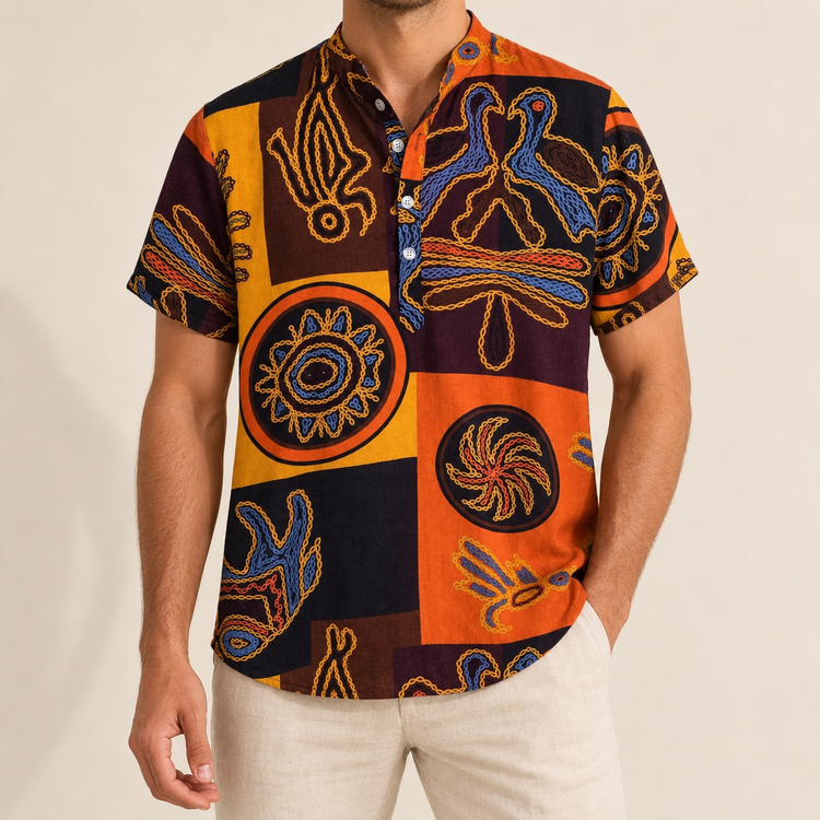 Model wearing an orange graphic panel shirt with a band collar and short button placket