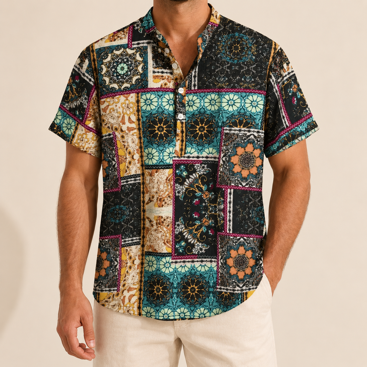 Model wearing a dark band-collar shirt with turquoise and gold ornamental panels