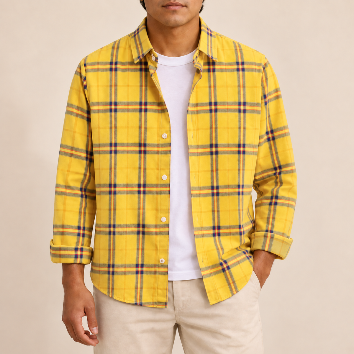 Model wearing a yellow plaid long-sleeve shirt