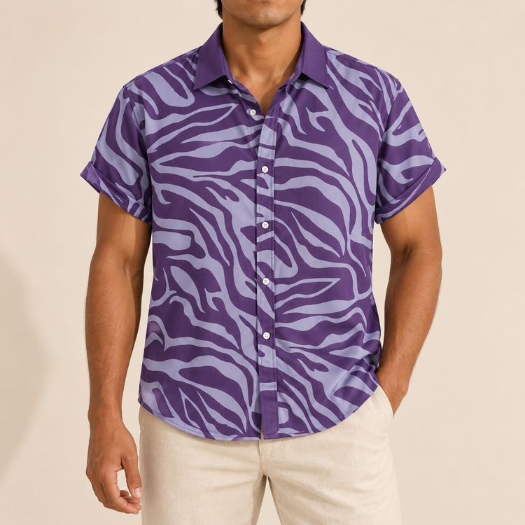 Model wearing purple short-sleeve shirt with pale zebra-style stripes