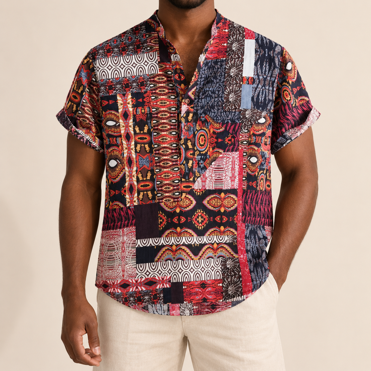 Model wearing a red and navy band-collar shirt with patterned borders
