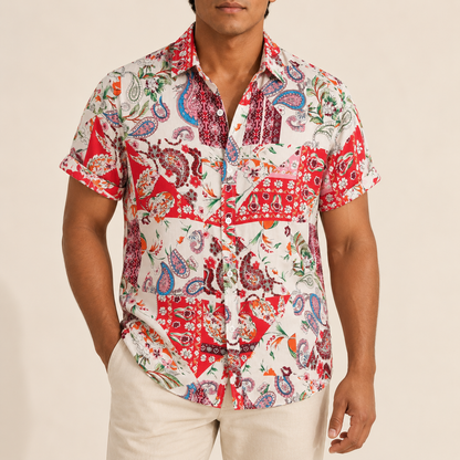 Model wearing a red and cream paisley patchwork short-sleeve shirt