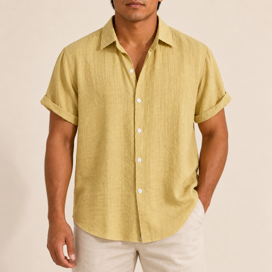 Model wearing a yellow textured short-sleeve button-up shirt