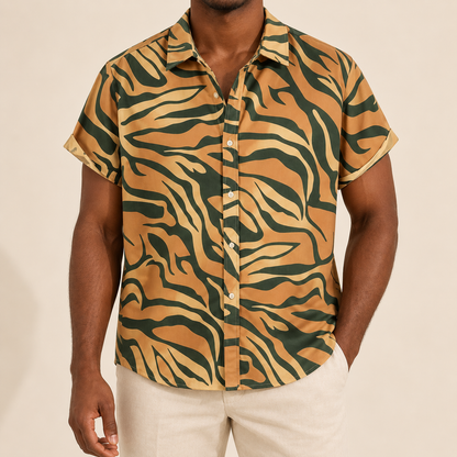 Model wearing tan short-sleeve shirt with dark green zebra-style stripes