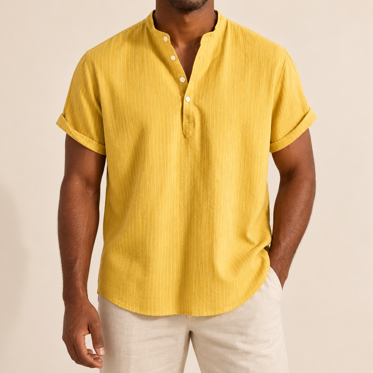 Model wearing a yellow band-collar shirt with fine vertical texture