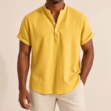 Model wearing a yellow band-collar shirt with fine vertical texture