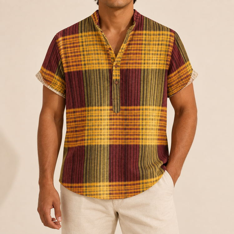 Model wearing a mustard and burgundy checked short-sleeve band-collar shirt